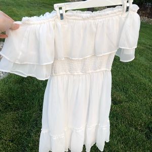 Flowing white off the shoulder dress